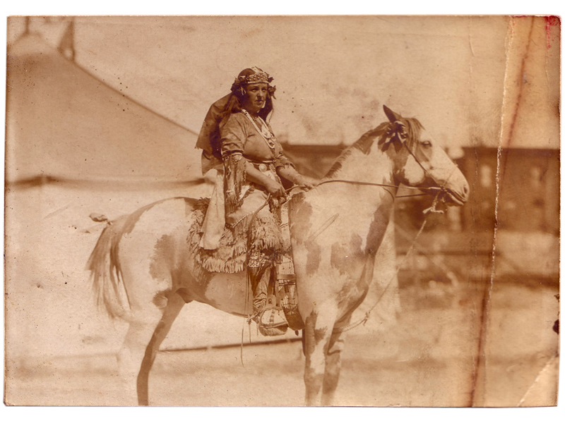Princess Wenona (Lillian Smith) on the grounds of a Wild West show. From Bee Ho's scrapbook, circa 1911.