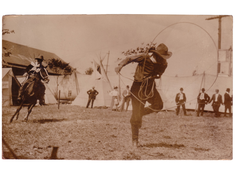 A cowboy doing the Texas Skip. Bee Ho approaching on horseback in Chickasha, Oklahoma, circa 1913.