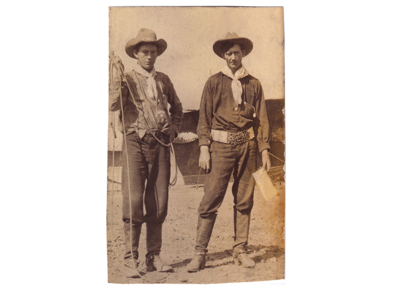 Bee Ho and an unidentified cowboy. Note Bee Ho is wearing a trophy belt, circa 1913.