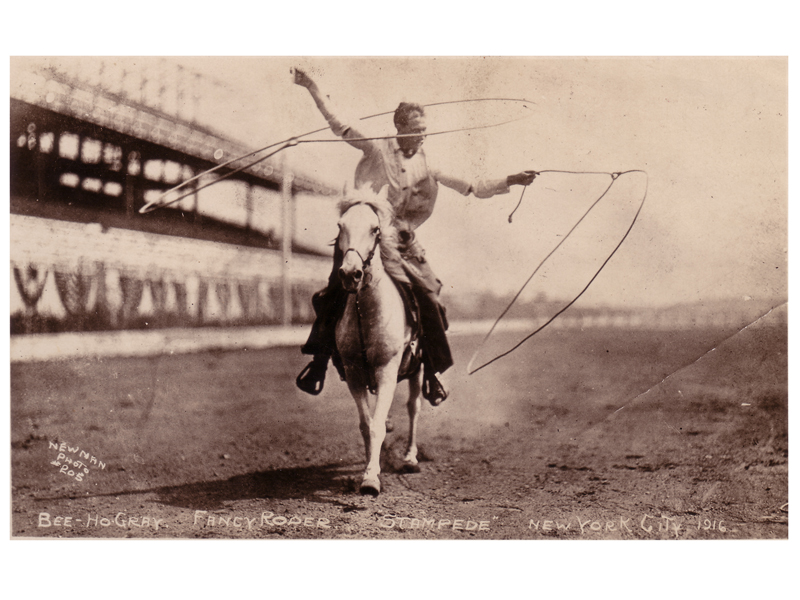 Bee Ho spinning two ropes while competing in the New York Stampede, 1916. 